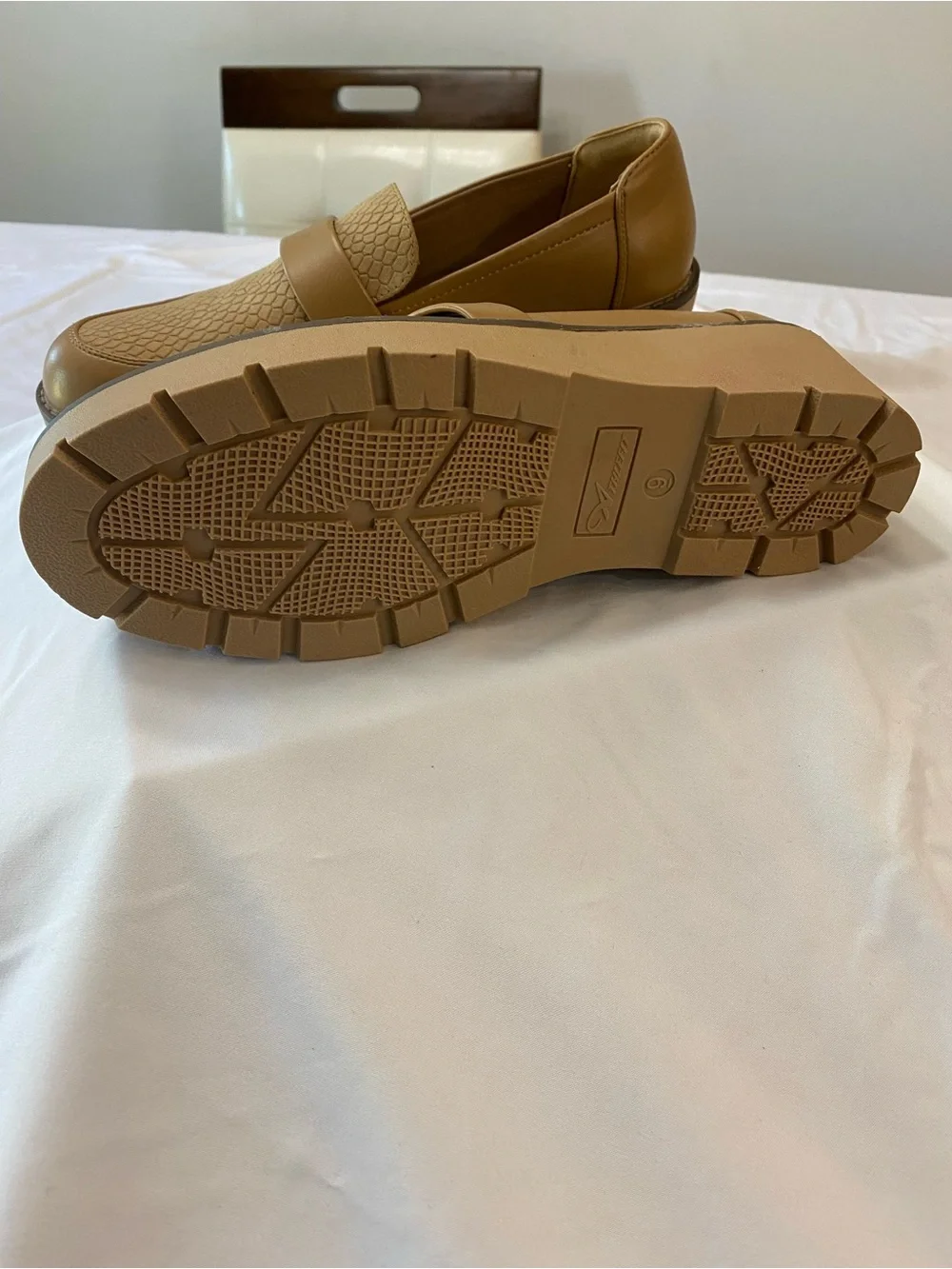 Woman’s Classic Tan Slip-On Loafers with Textured Vamp